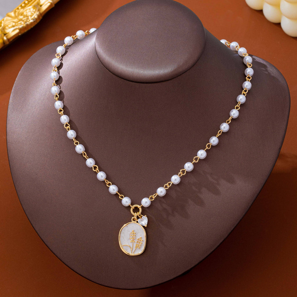 Pearl Chain Floral Oval Pendant Necklace