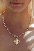 SMALL HAMMERED CROSS NECKLACE